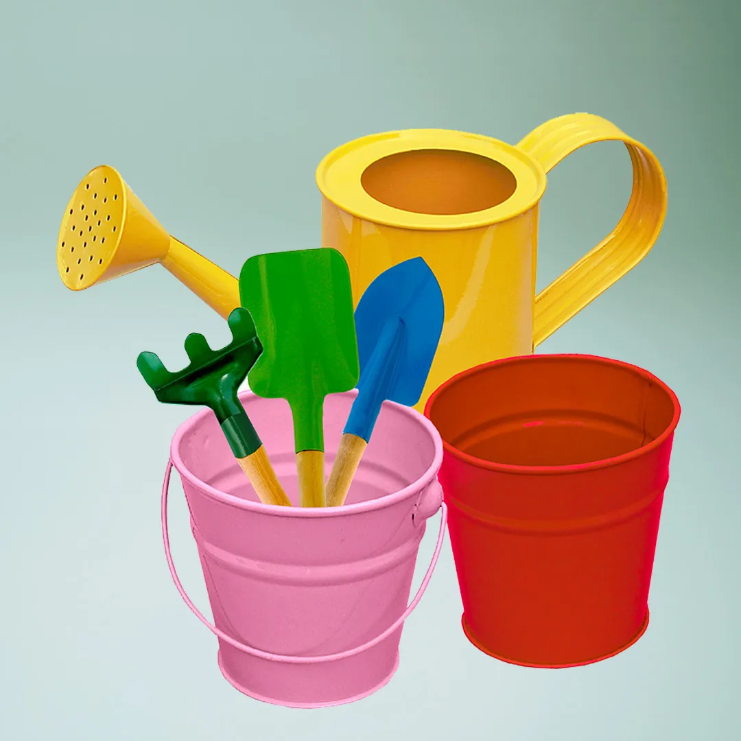 Assorted colorful buckets and a watering can on display.