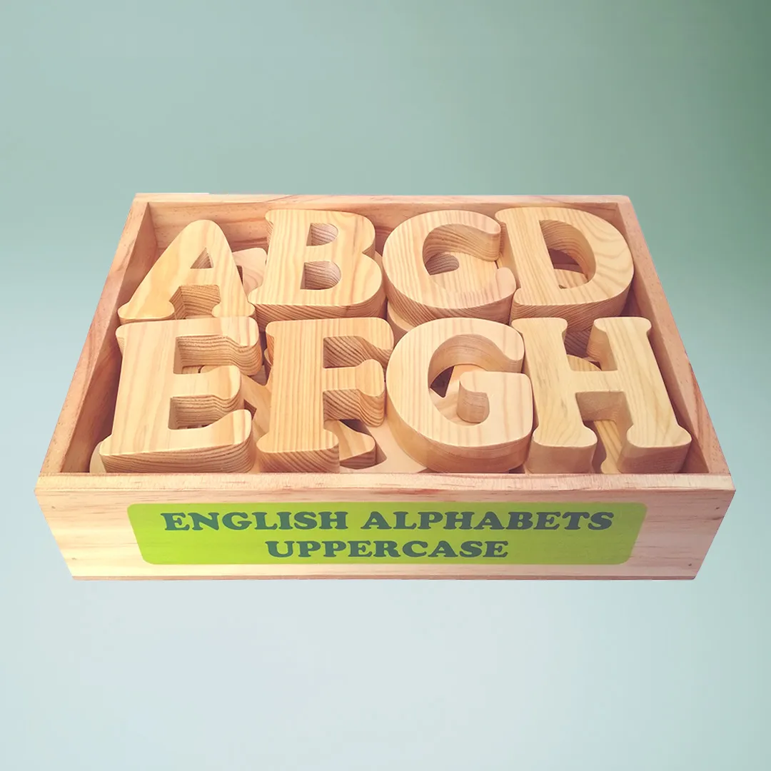 Uppercase wooden box with English alphabet letters in a wooden box.